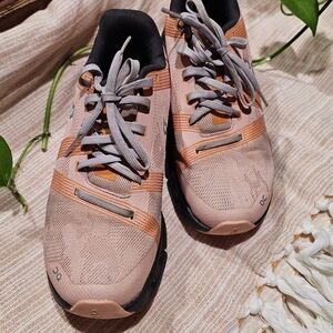 On Cloud Pink and Orange Athletic Shoes